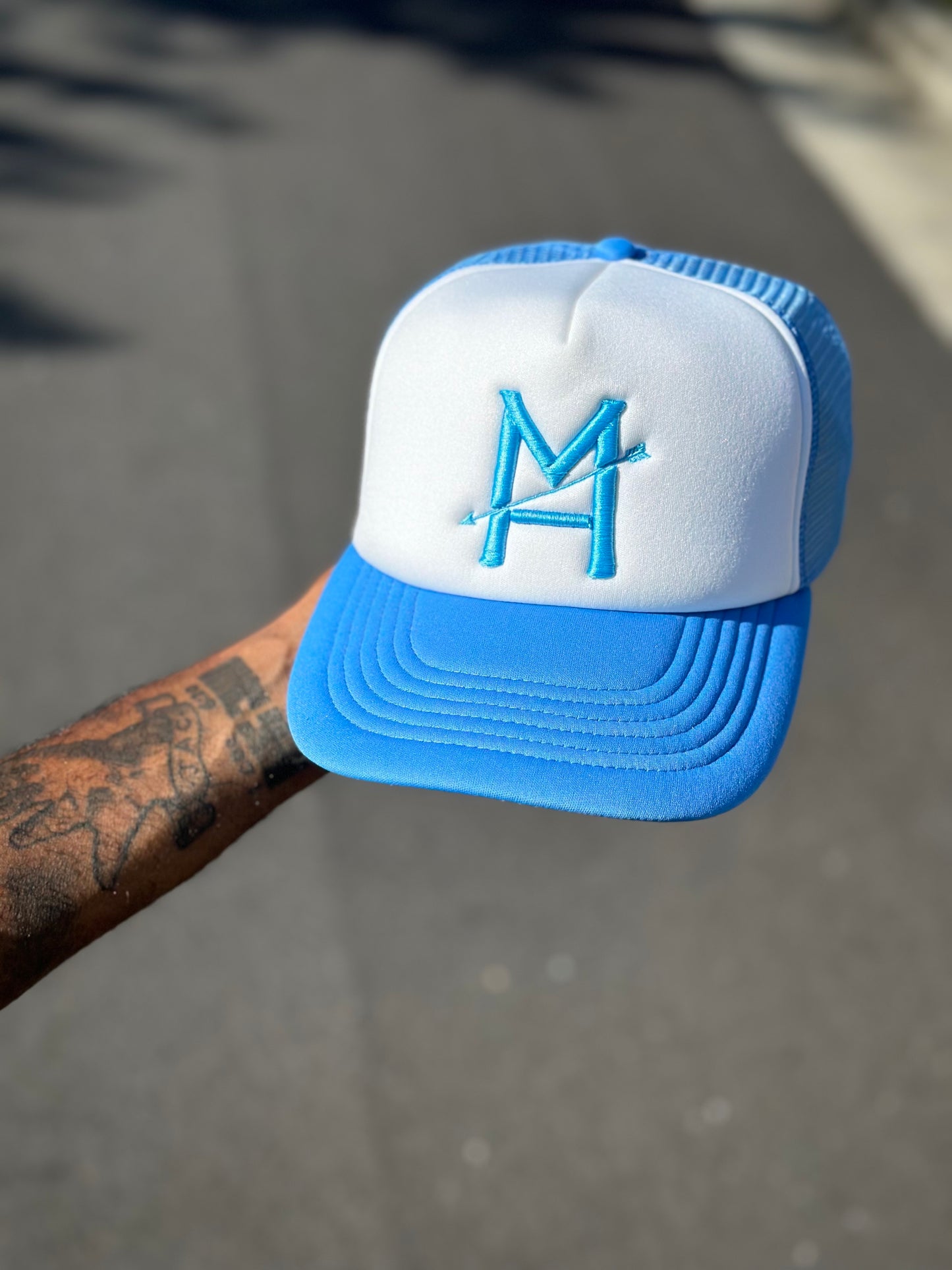 Light Blue M|H Arrow